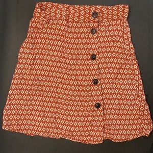 Mini skirt from H &M with red & white patterns. Size 2 US